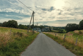 Stock Image: countryroad to a farm 12 9 19