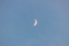 Stock Image: Crescent moon in the early evening