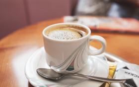 Stock Image: cup of coffee on a table in a restaurant