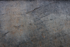 Stock Image: Dark rough stone texture