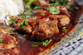 Stock Image: Delicious lamb steaks in roast sauce