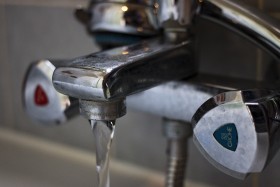 Stock Image: dirty bathroom faucet