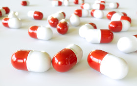 Stock Image: drugs pills capsule red and white medicine 3D illustration