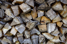 Stock Image: Dry chopped tree logs background