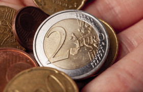 Stock Image: euro coins in hand