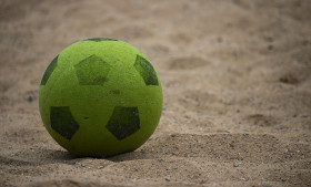 Stock Image: fabric ball in the sand