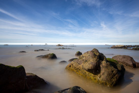 Stock Image: Faro Portugal Rocks in the Sea Panorama