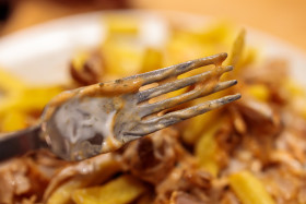 Stock Image: Fork smeared with sauce