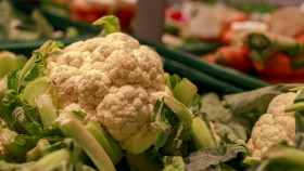 Stock Image: fresh cauliflower on market stall