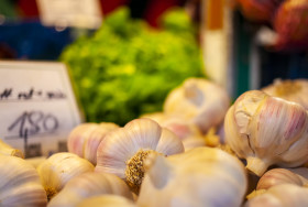 Stock Image: Fresh garlic for sale at a market