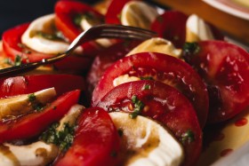 Stock Image: freshly harvested tomato with mozzarella