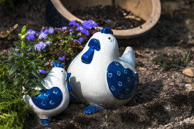 Stock Image: garden decoration blue chicken