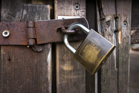 Stock Image: garden gate with padlock