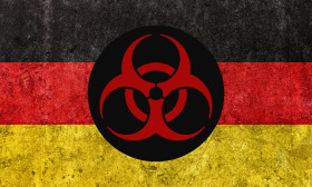 Stock Image: German flag with pandemic symbol
