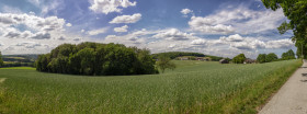 Stock Image: German rural landscape near Velbert Langenberg with fields and hills and a Farm in Background