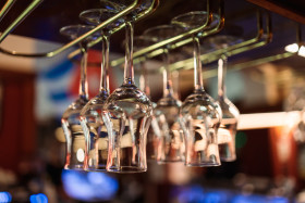 Stock Image: Glasses hanging in a bar