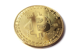 Stock Image: Golden bitcoin isolated on a white background