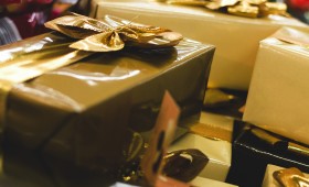 Stock Image: golden wrapped gift boxes