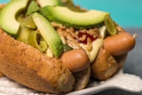 Stock Image: gourmet hot dogs with avocado slices