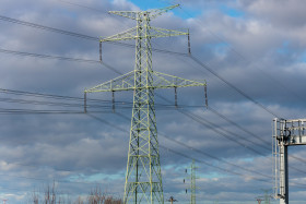 Stock Image: Green electricity pylon