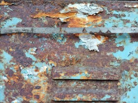Stock Image: Green Rusty Metal Texture of a Door