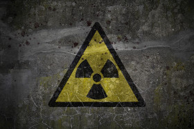 Stock Image: Grunge nuclear radiation symbol background