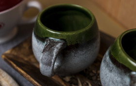 Stock Image: hand made green cups