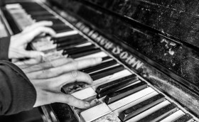 Stock Image: Hands on the piano
