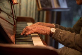 Stock Image: Hands on the piano