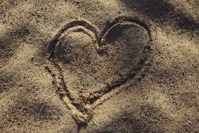 Stock Image: heart drawn in sand