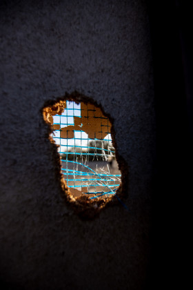 Stock Image: Hole in a wall