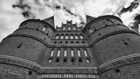 Stock Image: Holsten gate in Lubeck - Black and white
