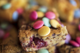 Stock Image: Homemade cake with chocolate lentils on a plate