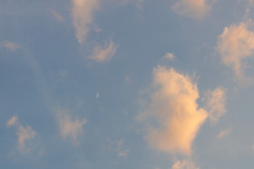 Stock Image: Horizontally photographed sky at evening time with clouds and the moon