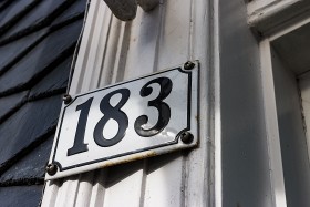 Stock Image: House number 183 - One hundred and eighty-three