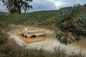 Stock Image: House sunken in the lake in Fonte Ferranha Portugal