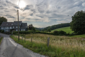 Stock Image: idyllic farm on the end of a road