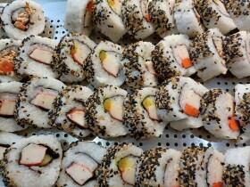 Stock Image: Inside-Out Sushi Rolls with Crab and Avocado