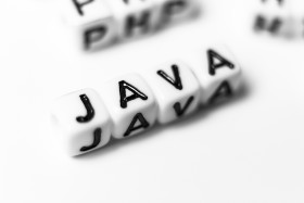 Stock Image: JAVA as a word - bright dice font concept