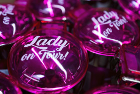 Stock Image: lady on tour pink box