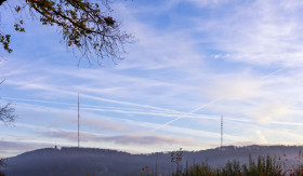 Stock Image: Langenberg shrouded in fog in the morning.