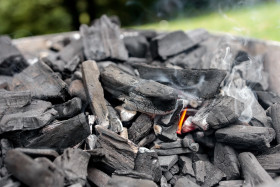 Stock Image: Lighting barbecue coal