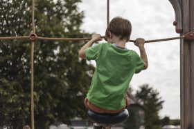 Stock Image: little boy on climbing frame
