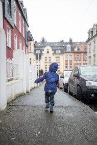 Stock Image: little girl is walking around the city