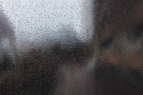 Stock Image: Lots of raindrops on a window background