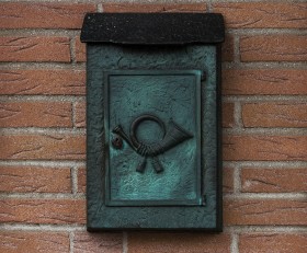 Stock Image: mailbox with old mail symbol