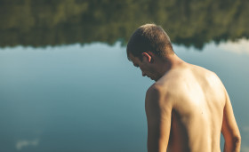 Stock Image: man in front of a lake