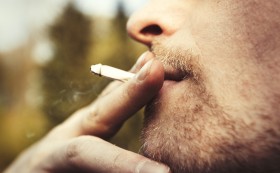 Stock Image: Man smoking a cigarette
