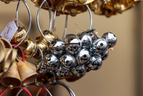 Stock Image: Melodic Adornments: Bells for Sheep and Animals at the Market