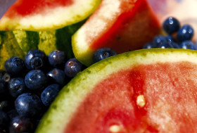 Stock Image: melons slices and blueberries